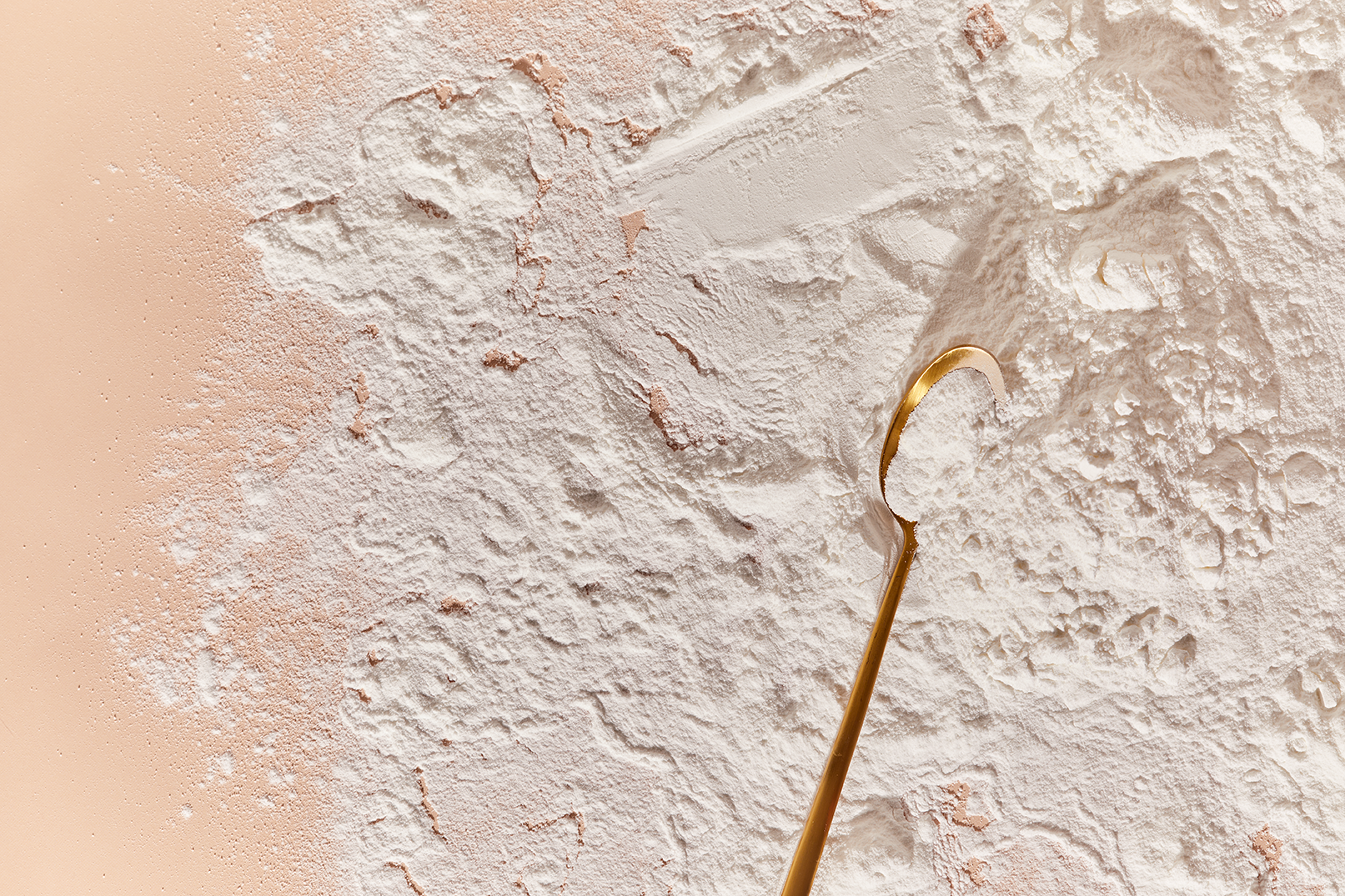 Close-up shot of marine tripeptide collagen powder, emphasizing its smooth texture and nutrient density