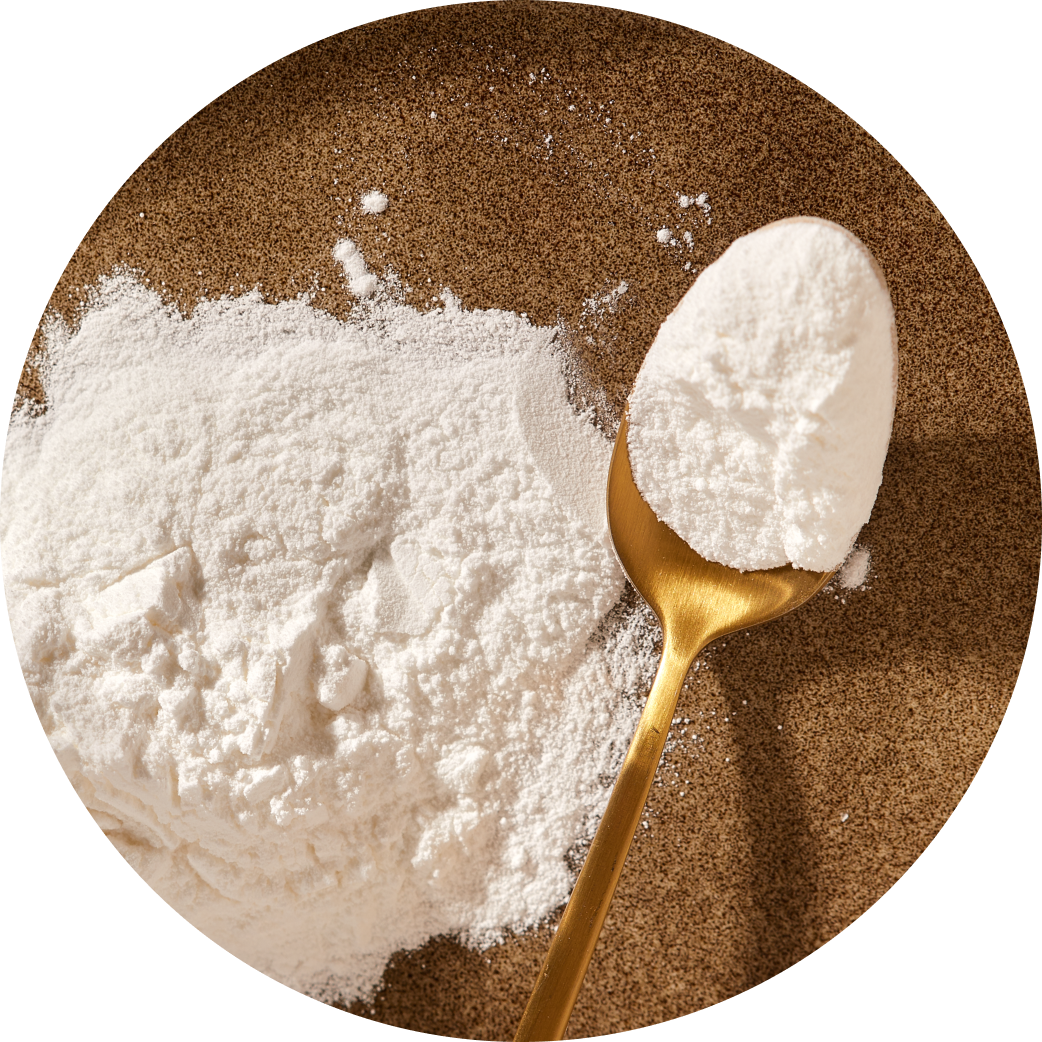 A spoonful of marine collagen powder placed on a plate, emphasizing its fine texture and nutritional benefits